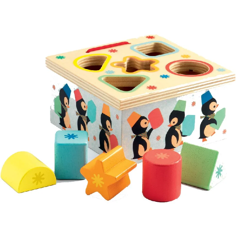 Wooden sand toys for beach or sandbox play​ Djeco geo junzo shape sorter