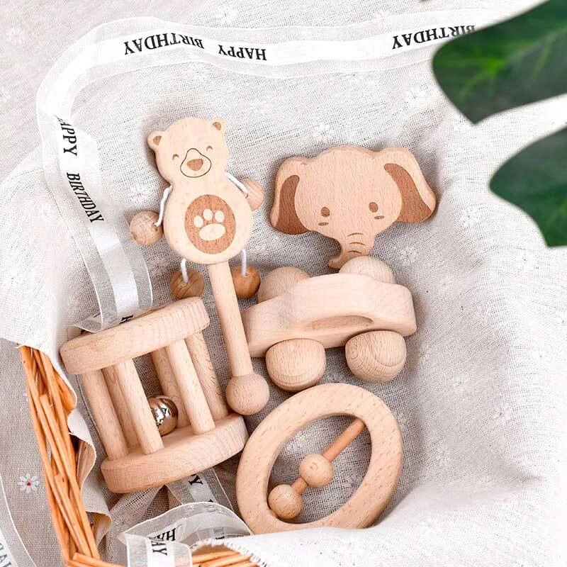 Wooden spinning tops for kinetic fun​ Newborn Hand Bell Set